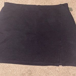 Black mini skirt with a slit